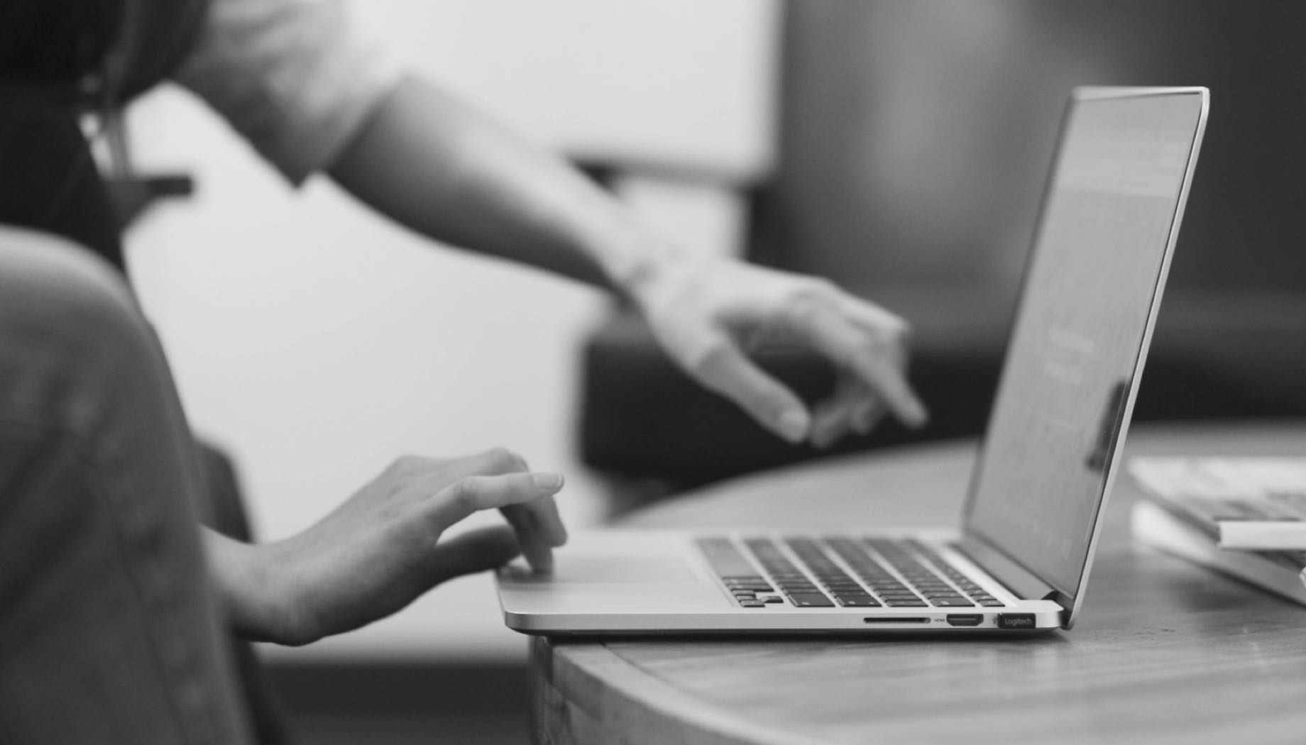 looking at a computer on a table top